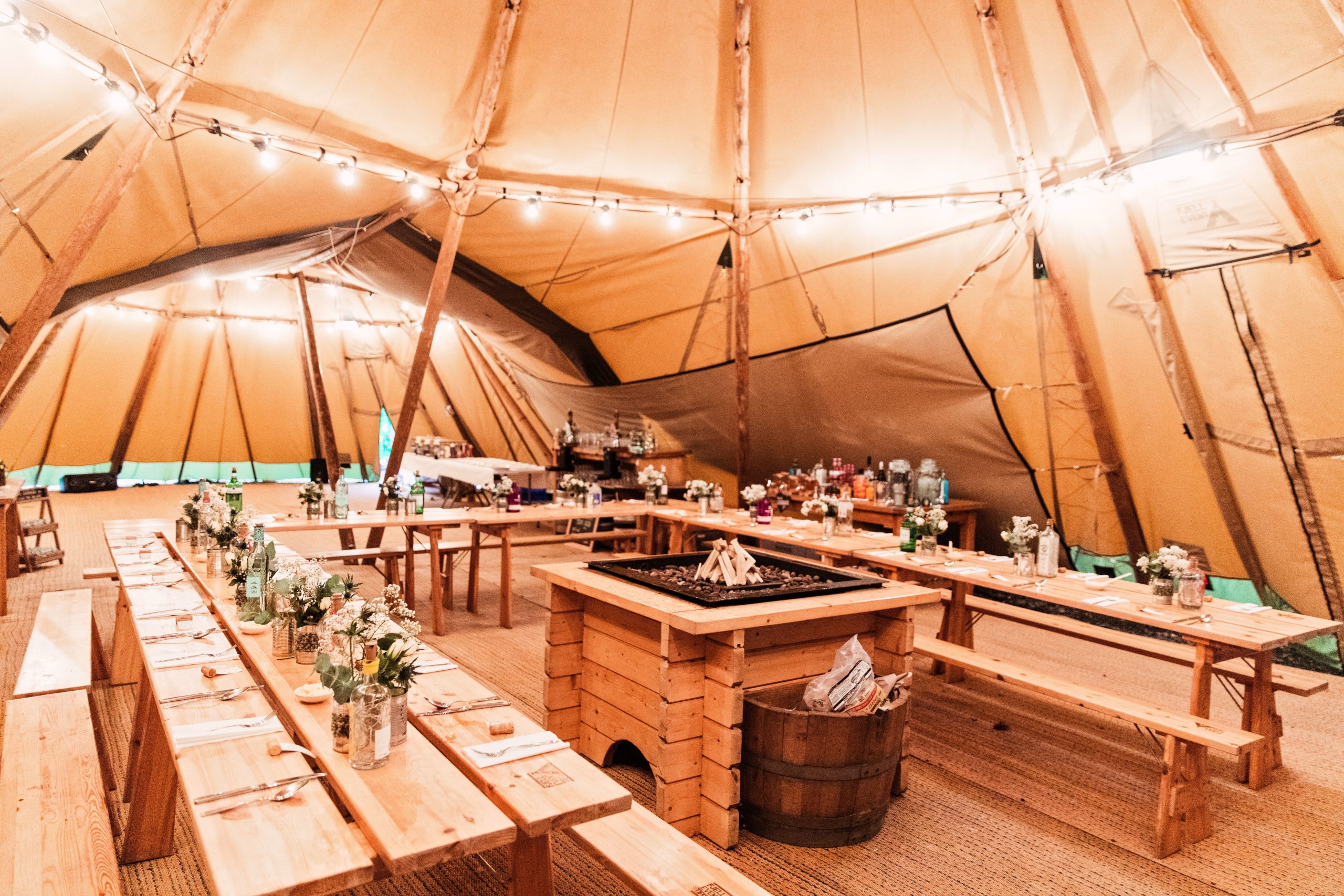 Couple celebrating their tipi wedding